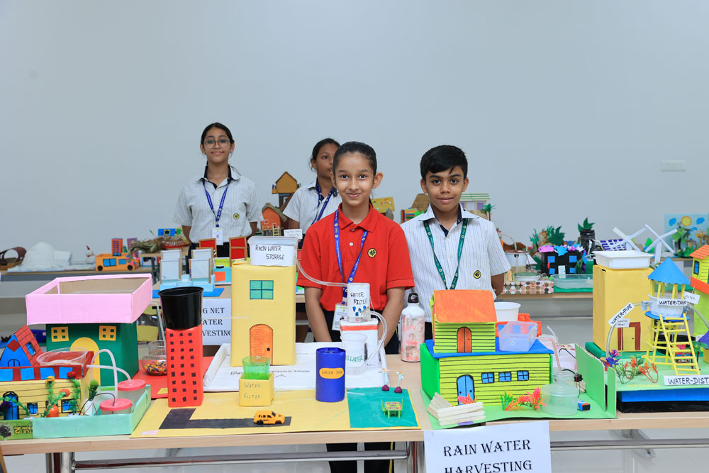 TSUS students presenting their handmade models with confidence in Show 'n' Tell